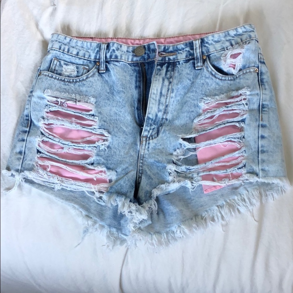 Distressed ripped jean shorts